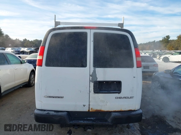 2009 Chevrolet Express Cargo z VIN 1GCFG15X391119234, wystawiony jako IAAI lot #41326818 z przebiegiem 566 304 mil mil oraz . Historia ofert i sprzedaży dostępna na DreamBid. Obrazek 16.
