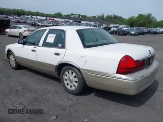 2004 Mercury Grand Marquis LS Premium z VIN 2MEFM75W04X678032, wystawiony jako IAAI lot #42341419 z przebiegiem 114 502 mil mil oraz . Historia ofert i sprzedaży dostępna na DreamBid. Obrazek 3.