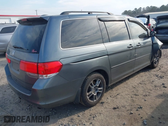 2010 Honda Odyssey EX-L with VIN 5FNRL3H7XAB099821, listed as a IAAI auction lot 41680729 with 217,458 mi miles and . Bid and sale history available at DreamBid. Image 4.