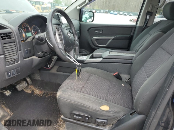 2015 Nissan Titan SV with VIN 1N6AA0EC9FN500624, listed as a Copart auction lot 50982985 with 128,976 mi miles and Salvage title. Bid and sale history available at DreamBid. Image 7.