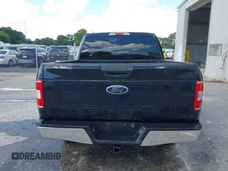 2019 Ford F-150 XL with VIN 1FTEW1E56KFA63764, listed as a IAAI auction lot 42410872 with 124,648 mi miles and . Bid and sale history available at DreamBid. Image 16.