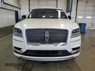 2018 Lincoln Navigator Reserve z VIN 5LMJJ3LT5JEL07993, wystawiony jako Copart lot #52983935 z przebiegiem 172 097 mil mil oraz Czysty tytuł • Clean title. Historia ofert i sprzedaży dostępna na DreamBid. Obrazek 5.