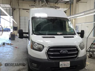 2020 Ford Transit Cargo z VIN 1FTBR1XG3LKB79165, wystawiony jako IAAI lot #42763042 z przebiegiem 140 992 mil mil oraz . Historia ofert i sprzedaży dostępna na DreamBid. Obrazek 30.