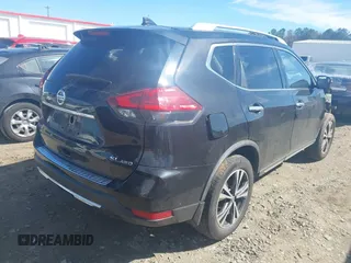 2017 Nissan Rogue S with VIN JN8AT2MV2HW013018, listed as a IAAI auction lot 41693946 with 128,667 mi miles and . Bid and sale history available at DreamBid. Image 4.