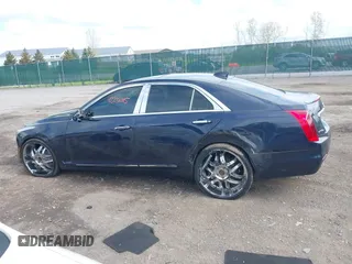 2015 Cadillac CTS Luxury AWD with VIN 1G6AX5SX5F0119102, listed as a IAAI auction lot 42231015 with 106,643 mi miles and . Bid and sale history available at DreamBid. Image 14.