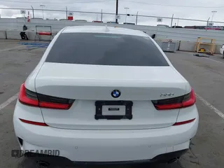 2021 BMW 3 Series 330i z VIN 3MW5R1J04M8C06043, wystawiony jako IAAI lot #42109872 z przebiegiem 62 325 mil mil oraz . Historia ofert i sprzedaży dostępna na DreamBid. Obrazek 16.