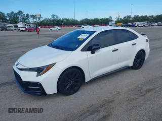 2021 Toyota Corolla SE with VIN 5YFS4MCE9MP075707, listed as a IAAI auction lot 41409994 with 39,544 mi miles. Bid and sale history available at carsss.com. Image 2.