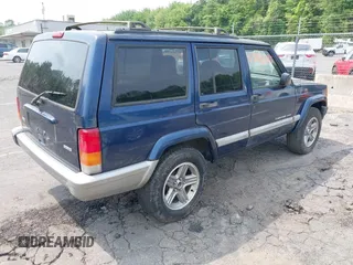 2001 Jeep Cherokee Sport with VIN 1J4FT48S01L604740, listed as a IAAI auction lot 42440685 with 198,284 mi miles and . Bid and sale history available at DreamBid. Image 4.