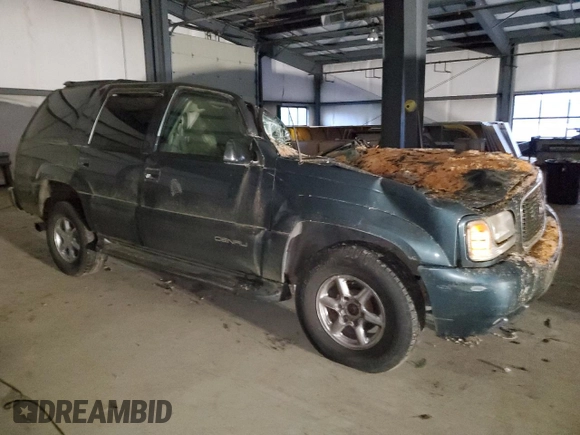 1999 GMC Denali z VIN 1GKEK13R5XR918465, wystawiony jako Copart lot #83269184 z przebiegiem Nie podano mil oraz Nie do naprawy. Historia ofert i sprzedaży dostępna na DreamBid. Obrazek 4.