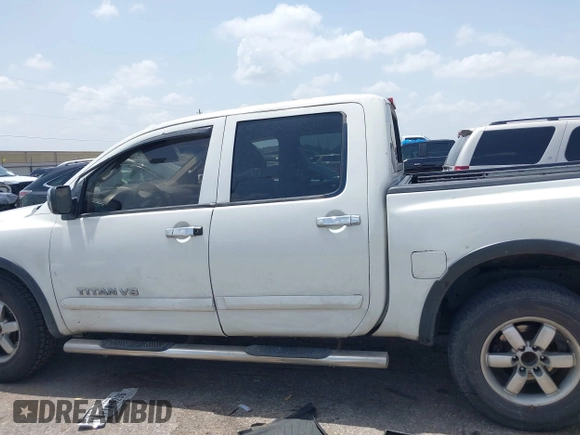 2012 Nissan Titan SL with VIN 1N6BA0EC1CN326919, listed as a IAAI auction lot 42630368 with 230,215 mi miles and . Bid and sale history available at DreamBid. Image 14.