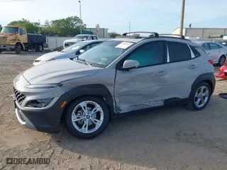 2022 Hyundai Kona SEL with VIN KM8K32AB2NU793938, listed as a IAAI auction lot 41889055 with 49,969 mi miles. Bid and sale history available at carsss.com. Image 2.