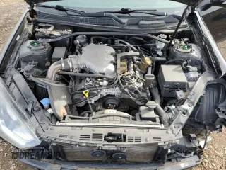 2013 Hyundai Genesis Coupe Track z VIN KMHHU6KJ4DU089727, wystawiony jako Copart lot #50002495 z przebiegiem 99 869 mil mil oraz Szkoda całkowita • Salvage title. Historia ofert i sprzedaży dostępna na DreamBid. Obrazek 11.