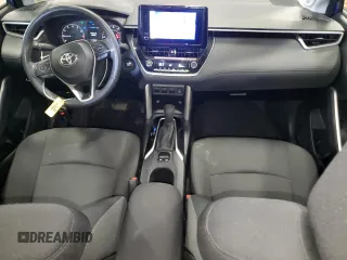 2024 Toyota Corolla Cross LE with VIN 7MUBAABG5RV088288, listed as a Copart auction lot 52493325 with 59,788 mi miles and Clean title. Bid and sale history available at DreamBid. Image 8.