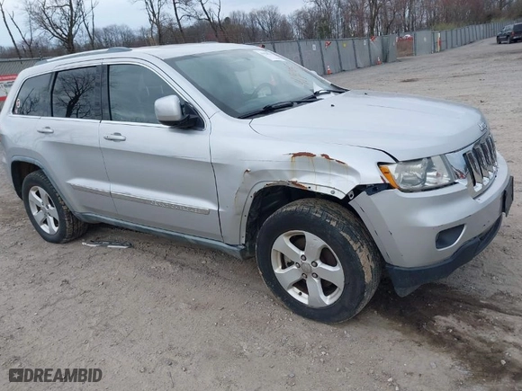 2011 Jeep Grand Cherokee Laredo with VIN 1J4RR4GG9BC718861, listed as a IAAI auction lot 41920517 with 144,245 mi miles. Bid and sale history available at carsss.com. Image 1.