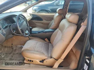 1996 Mercury Cougar z VIN 1MELM62W6TH629420, wystawiony jako Copart lot #67101634 z przebiegiem 71 996 mil mil oraz Szkody całkowita. Historia ofert i sprzedaży dostępna na DreamBid. Obrazek 7.