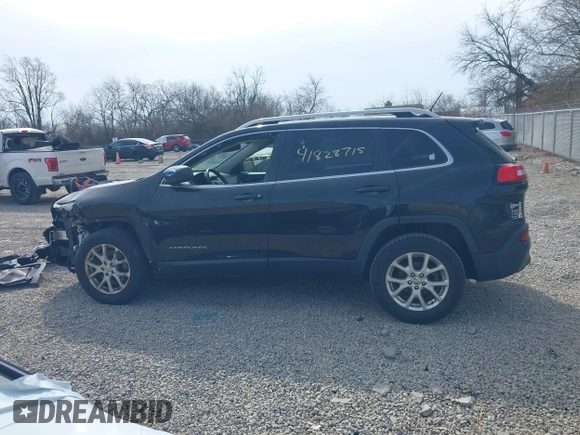2015 Jeep Cherokee Latitude with VIN 1C4PJLCB3FW517843, listed as a IAAI auction lot 41828715 with 146,862 mi miles and . Bid and sale history available at DreamBid. Image 15.