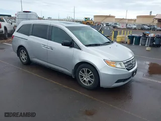 2012 Honda Odyssey EX-L with VIN 5FNRL5H68CB056567, listed as a IAAI auction lot 41014382 with 101,885 mi miles. Bid and sale history available at carsss.com. Image 1.