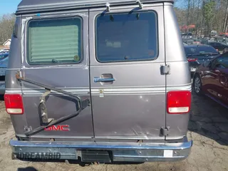 1993 GMC Vandura z VIN 1GDEG25KXPF515274, wystawiony jako IAAI lot #41663966 z przebiegiem 112 288 mil mil oraz . Historia ofert i sprzedaży dostępna na DreamBid. Obrazek 16.