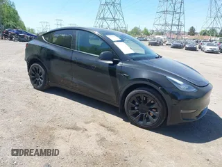 2023 Tesla Model Y Long Range with VIN 7SAYGDEE0PA111430, listed as a IAAI auction lot 42156924 with 35,950 mi miles and . Bid and sale history available at DreamBid. Image 1.