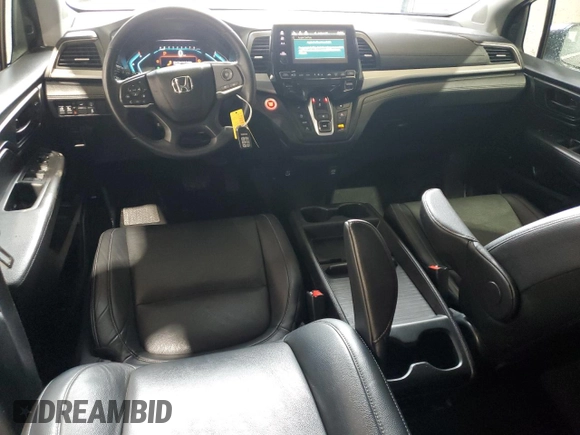 2022 Honda Odyssey EX-L with VIN 5FNRL6H74NB053215, listed as a Copart auction lot 54205895 with 57,958 mi miles and Salvage Title. Bid and sale history available at DreamBid. Image 8.