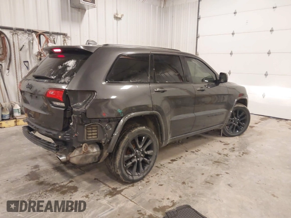 2018 Jeep Grand Cherokee Laredo E with VIN 1C4RJFAG6JC499261, listed as a IAAI auction lot 41033418 with 67,554 mi miles and . Bid and sale history available at DreamBid. Image 4.