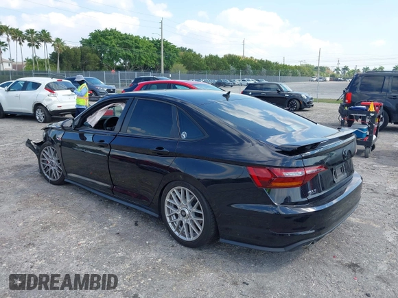2019 Volkswagen Jetta GLI S with VIN 3VW5T7BU9KM142379, listed as a IAAI auction lot 42056617 with 77,283 mi miles and . Bid and sale history available at DreamBid. Image 3.