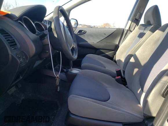 2008 Honda Fit z VIN JHMGD38458S812677, wystawiony jako Copart lot #52879675 z przebiegiem 150 814 mil mil oraz Szkoda całkowita • Salvage title. Historia ofert i sprzedaży dostępna na DreamBid. Obrazek 7.