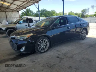 2013 Toyota Avalon XLE z VIN 4T1BK1EB1DU003129, wystawiony jako Copart lot #57685895 z przebiegiem 169 914 mil mil oraz Szkoda całkowita • Salvage title. Historia ofert i sprzedaży dostępna na DreamBid. Obrazek 1.
