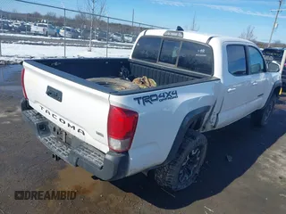 2016 Toyota Tacoma SR with VIN 5TFCZ5AN1GX017336, listed as a IAAI auction lot 41542111 with 127,162 mi miles. Bid and sale history available at carsss.com. Image 4.
