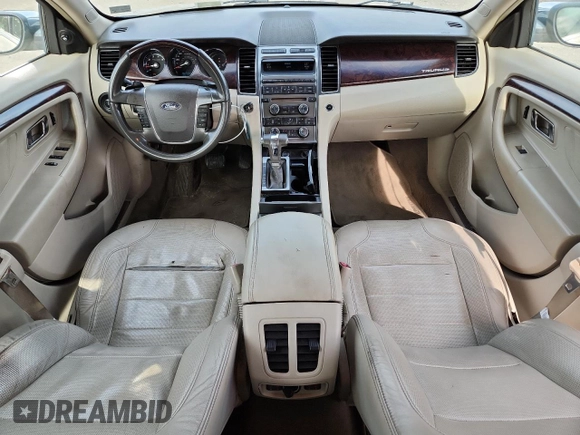 2010 Ford Taurus Limited with VIN 1FAHP2FW7AG138753, listed as a Copart auction lot 64880025 with 242,728 mi miles and Clean title. Bid and sale history available at DreamBid. Image 8.