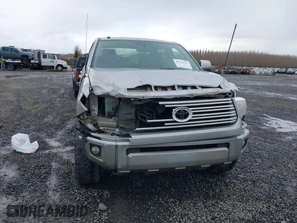 2017 Toyota Tundra Platinum z VIN 5TFAY5F12HX666144, wystawiony jako IAAI lot #41576751 z przebiegiem 131 514 mil mil oraz . Historia ofert i sprzedaży dostępna na DreamBid. Obrazek 13.