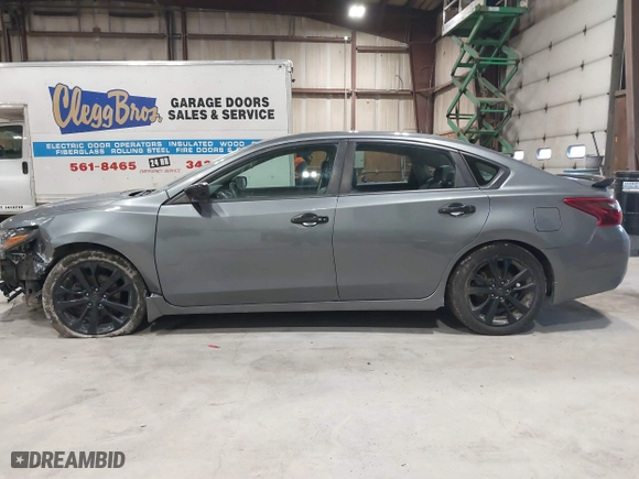 2018 Nissan Altima 2.5 SV with VIN 1N4AL3AP5JC470135, listed as a IAAI auction lot 41801045 with 122,452 mi miles. Bid and sale history available at carsss.com. Image 14.