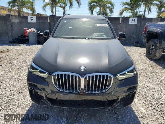 2022 BMW X5 sDrive40i with VIN 5UXCR4C06N9L04487, listed as a Copart auction lot 47788655 with 49,687 mi miles and Salvage Title. Bid and sale history available at carsss.com. Image 5.