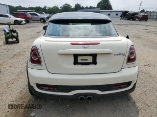 2014 MINI Coupe S z VIN WMWSX3C5XET409347, wystawiony jako Copart lot #56321384 z przebiegiem 81 070 mil mil oraz Szkody całkowita. Historia ofert i sprzedaży dostępna na DreamBid. Obrazek 6.