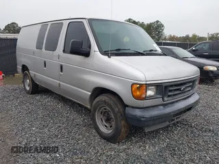 2005 Ford Econoline Cargo with VIN 1FTRE14W85HA67080, listed as a IAAI auction lot 40910996 with 599,247 mi miles. Bid and sale history available at carsss.com. Image 1.