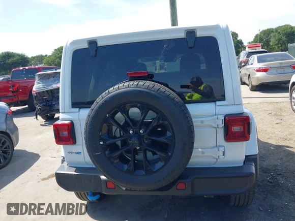 2024 Jeep Wrangler Sahara with VIN 1C4RJXP64RW225507, listed as a IAAI auction lot 42245973 with 45,984 mi miles and . Bid and sale history available at DreamBid. Image 16.
