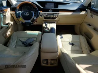 2014 Lexus ES 300h with VIN JTHBW1GG2E2051025, listed as a Copart auction lot 56719295 with 193,724 mi miles and Salvage title. Bid and sale history available at DreamBid. Image 8.