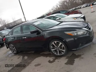 2016 Nissan Altima SR with VIN 1N4AL3AP8GC177922, listed as a IAAI auction lot 41802573 with 160,799 mi miles and . Bid and sale history available at carsss.com. Image 13.