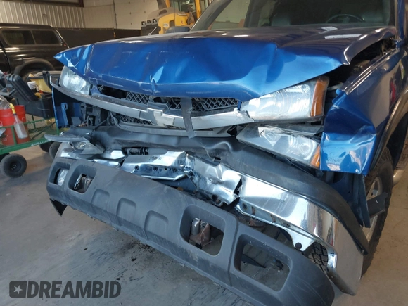 2003 Chevrolet Silverado 1500 with VIN 2GCEK19T331269122, listed as a IAAI auction lot 41461220 with 232,214 mi miles. Bid and sale history available at carsss.com. Image 6.