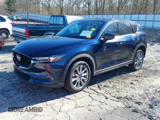 2021 Mazda CX-5 Grand Touring with VIN JM3KFADM5M0428279, listed as a IAAI auction lot 41747175 with 49,579 mi miles. Bid and sale history available at carsss.com. Image 18.