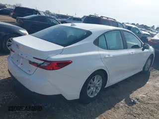 2025 Toyota Camry LE with VIN 4T1DAACK3SU529581, listed as a IAAI auction lot 41376433 with 5,283 mi miles and . Bid and sale history available at DreamBid. Image 4.