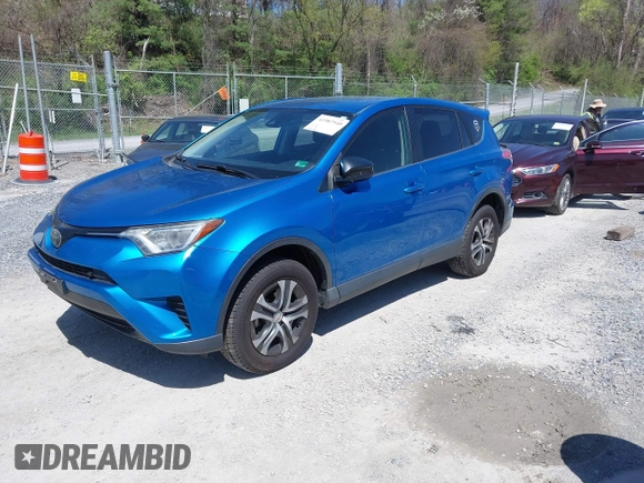 2018 Toyota RAV4 LE with VIN JTMZFREV4JJ734702, listed as a IAAI auction lot 41987540 with 141,526 mi miles. Bid and sale history available at carsss.com. Image 19.