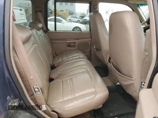 2000 Ford Explorer Eddie Bauer with VIN 1FMZU74E4YZA75510, listed as a Copart auction lot 75601964 with 196,180 mi miles and Salvage title. Bid and sale history available at DreamBid. Image 10.