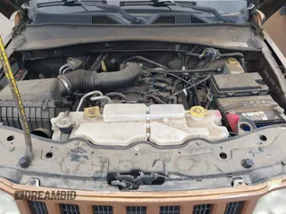 2011 Jeep Liberty Limited 70th Anniversary with VIN 1J4PN5GK4BW557704, listed as a IAAI auction lot 42078000 with 93,675 mi miles and . Bid and sale history available at DreamBid. Image 10.