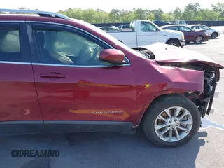 2019 Jeep Cherokee Latitude with VIN 1C4PJLCB4KD358305, listed as a IAAI auction lot 41990957 with 121,024 mi miles. Bid and sale history available at carsss.com. Image 22.