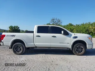 2016 Nissan Titan Platinum Reserve with VIN 1N6BA1F4XGN517905, listed as a IAAI auction lot 42676671 with 110,004 mi miles and . Bid and sale history available at DreamBid. Image 13.