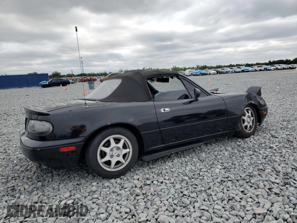 1994 Mazda MX-5 Miata with VIN JM1NA3534R0513305, listed as a Copart auction lot 52489865 with 150,481 mi miles and Salvage title. Bid and sale history available at DreamBid. Image 3.