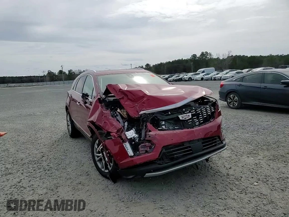 2022 Cadillac XT5 FWD Premium Luxury z VIN 1GYKNCRS9NZ130520, wystawiony jako Copart lot #47178275 z przebiegiem 8 564 mil mil oraz Szkoda całkowita • Salvage title. Historia ofert i sprzedaży dostępna na DreamBid. Obrazek 11.