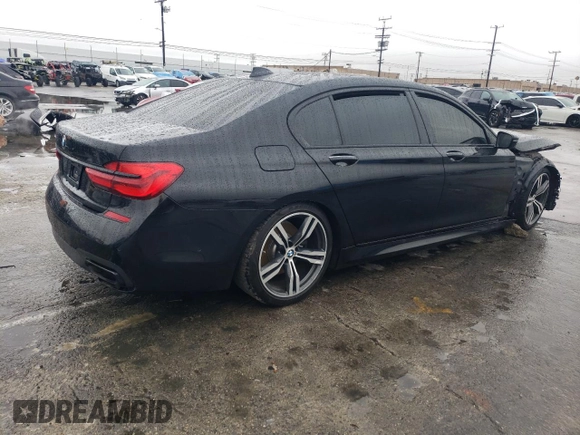 2018 BMW 7 Series 750i with VIN WBA7F0C54JGM22895, listed as a Copart auction lot 44083875 with 0 mi miles and Clean Title. Bid and sale history available at carsss.com. Image 3.