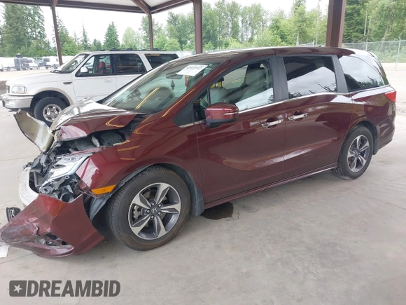 2019 Honda Odyssey Touring z VIN 5FNRL6H88KB030847, wystawiony jako IAAI lot #42433312 z przebiegiem Nie podano mil oraz . Historia ofert i sprzedaży dostępna na DreamBid. Obrazek 16.